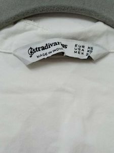I am selling my white shirt rarely used