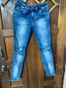 Ripped Blue Denim Jeans