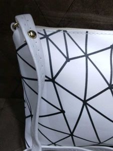 White Sling Bag.