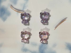 2 Hello Kitty Charms