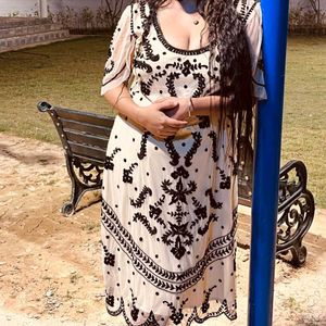A Beautiful Dress With Black Embroidery...