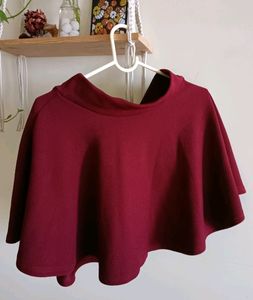 Flared mini skirt in maroon colour