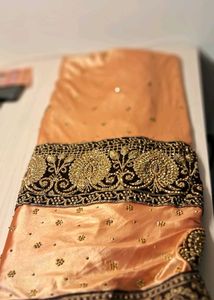 Shimmery Orange Sari With Stone Work