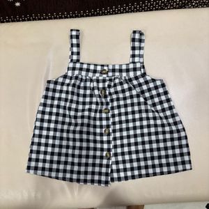 A Black and White Crop Top