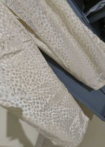 Cream Colour Animal print loose fitted trousers