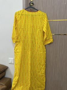 Yellow Printed Kurta And Red Pallazzo