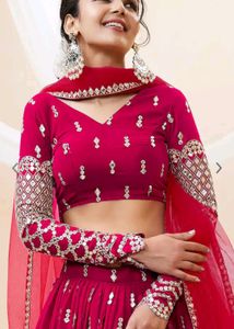 Pink And Gold Toned Embroidered Lehenga Choli