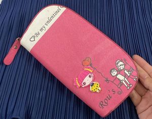 Chic Pink Clutch Wallet with Cute Illustrations