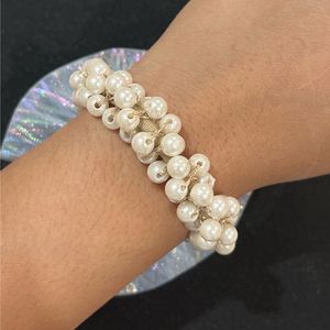 Pearl Beaded Rubber Band With Blue Bow