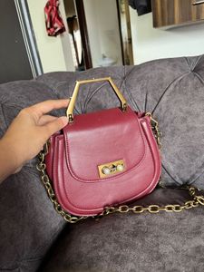Charles &amp; Keith Burgundy Saddle Bag