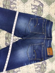Combo of Black shirt and blue jeans