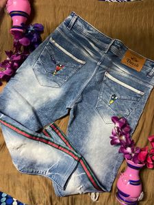 Ripped Jeans with Striped Detail