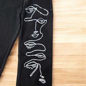 Black Wide-Leg Artistic Face Print Pants