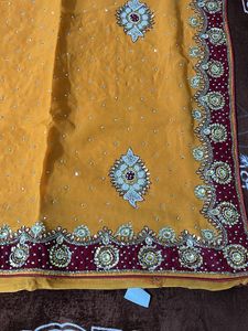 heavy work yellow red velvet border saree with blo