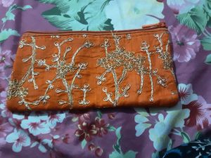 New Embroidered Orange Pouch