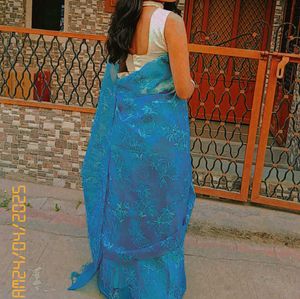 Saree With High Neck Blouse