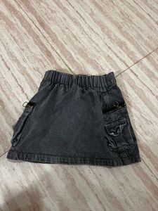 denim skir, white ribbed t shirt and  jac