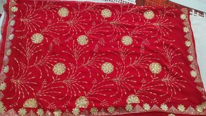 Radiant Red Saree with Intricate Gold Sequins