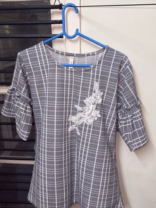 grey and white tunic