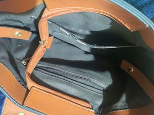 Brown Bucket Shaped Structured Handbag