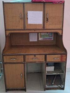 A Very Nice Study Table With 2 Sitting Tables Is Available At An Affordable Price With Attached Light And Good Space. The Bottom 5 Drawers Dusts Down Itself But A Coat Of Paint Will Fix It.