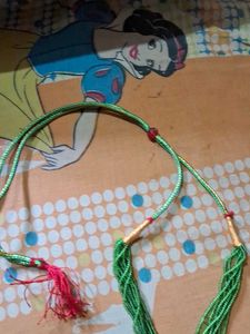 Multi Layered Cute Green Beats Mala With Locket