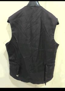 Black purple waist coat.