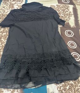 black frill top