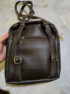 Brown Mini Backpack with Charm