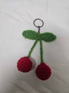 Homemade crochet cherry keychain