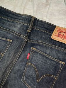 Levi&#39;s 585 Mid Rise Skinny Jeans