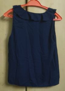 Elegant Ruffle Sleeveless Top
