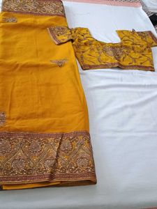Elegant Yellow Embroidered Saree