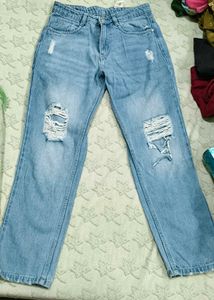 Ripped Blue Denim Jeans