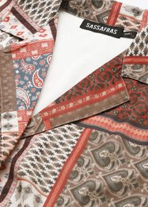 Geometric printed wrap crop top