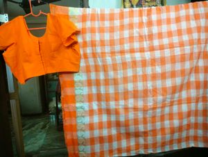 Orange Saree With Matching Blouse.