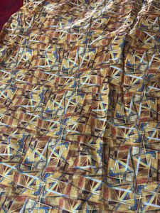 Red Saree With Yellow Design Border.