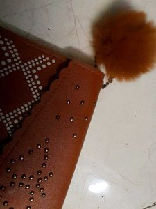Brown Clutch with Pom-Pom