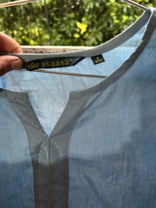 Blue Kurti With Silver Threads On It