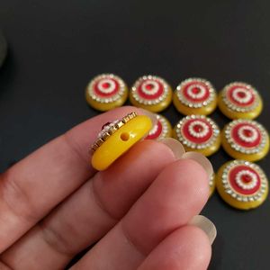 yellow and red diamond embellishment