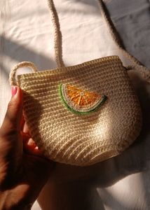 A sling purse