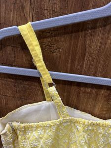 Yellow Embroidered Peplum Top