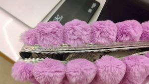 Fuzzy Purple Clutch