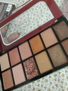 Swiss Beauty Concealer and Mars eyeshadow palette