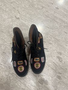 Black patch army boots