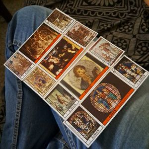 12 Vintage AJMAN painting stamps.