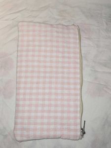 It's  Pink and white Pouch !