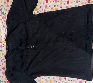 black top with ruffles sleeves