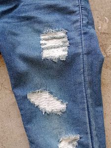 Distressed High-Waisted Jeans