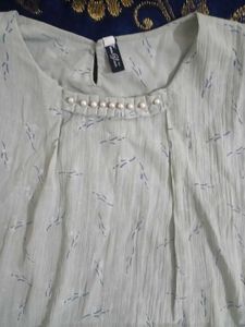 Elegant Pearl-Neckline Blouse